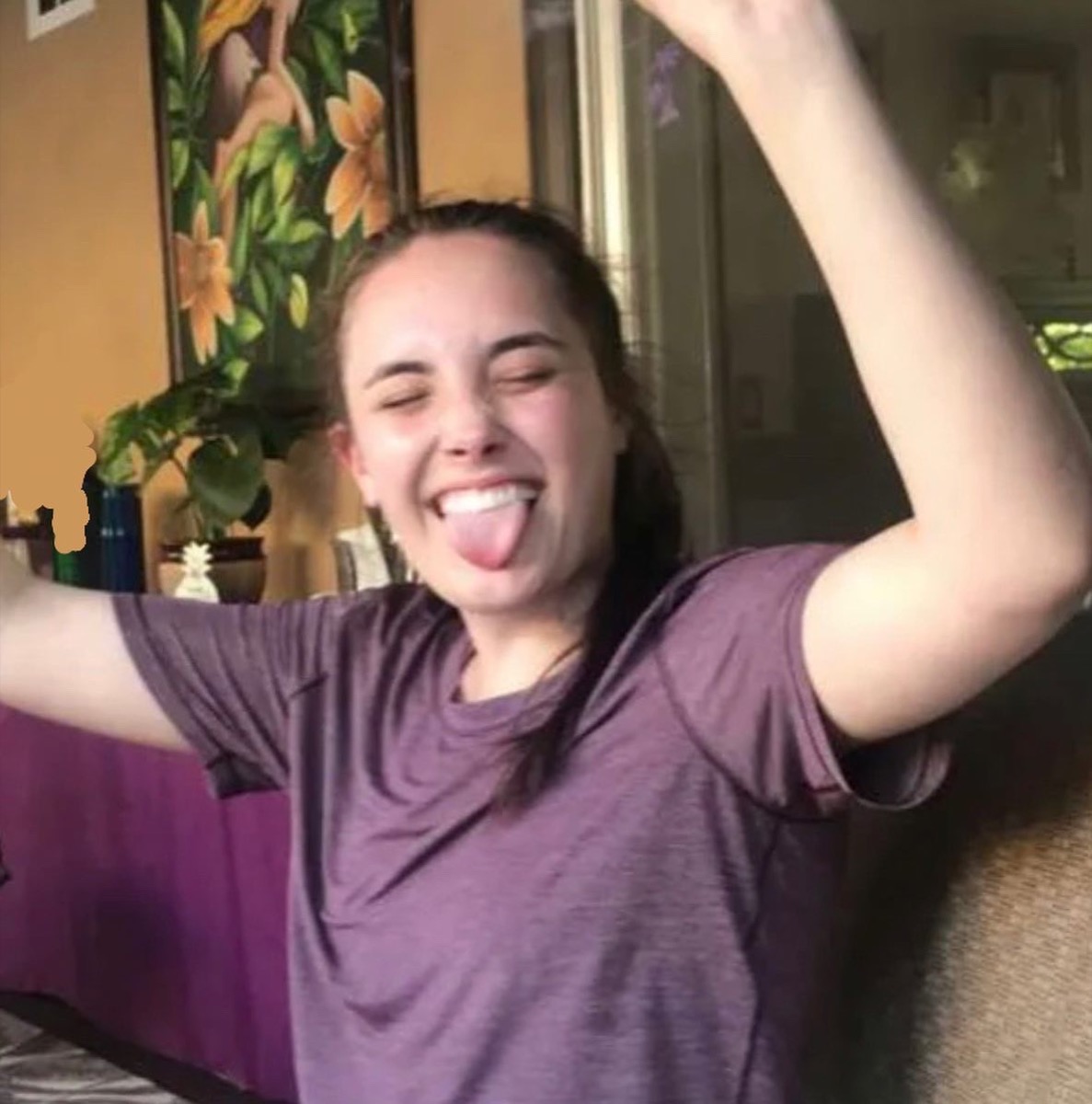 Bella cheering with her tongue out